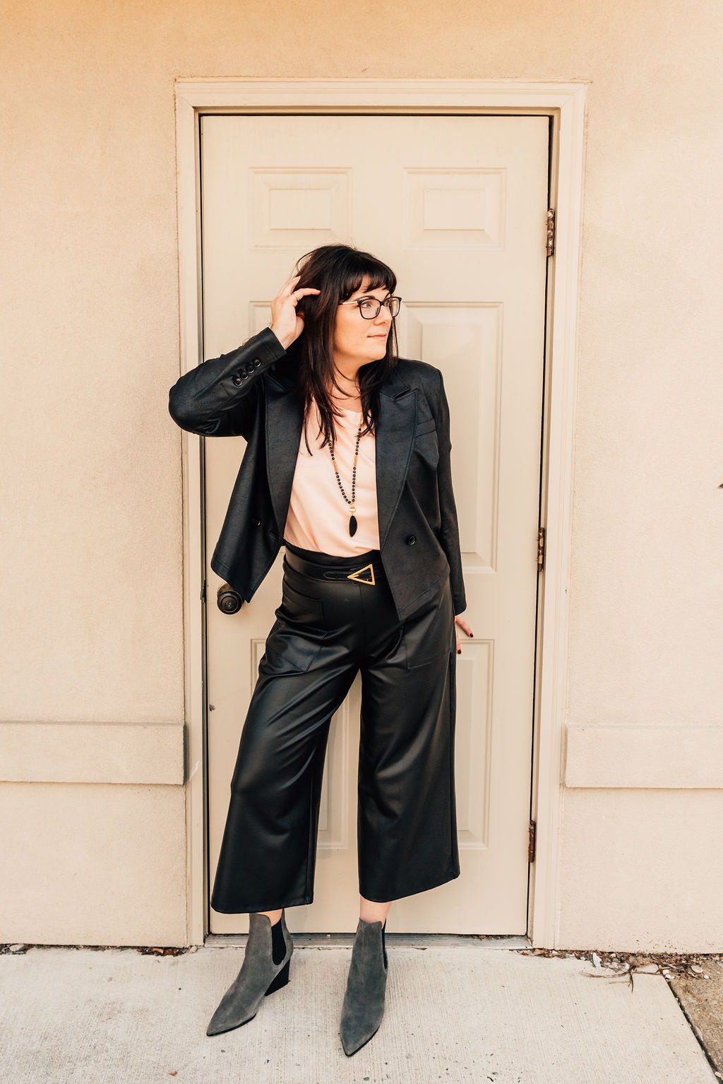 faux leather jacket and wide leg pants
