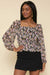 Smocked Long Sleeve Peplum Top